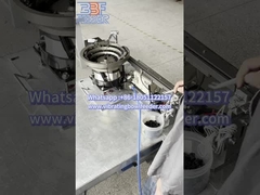 Вибрирующий подающий сосуд для транспортировки мелких деталей